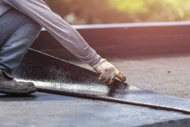 Professional Basement Waterproofing technician working in Perkiomenville, PA